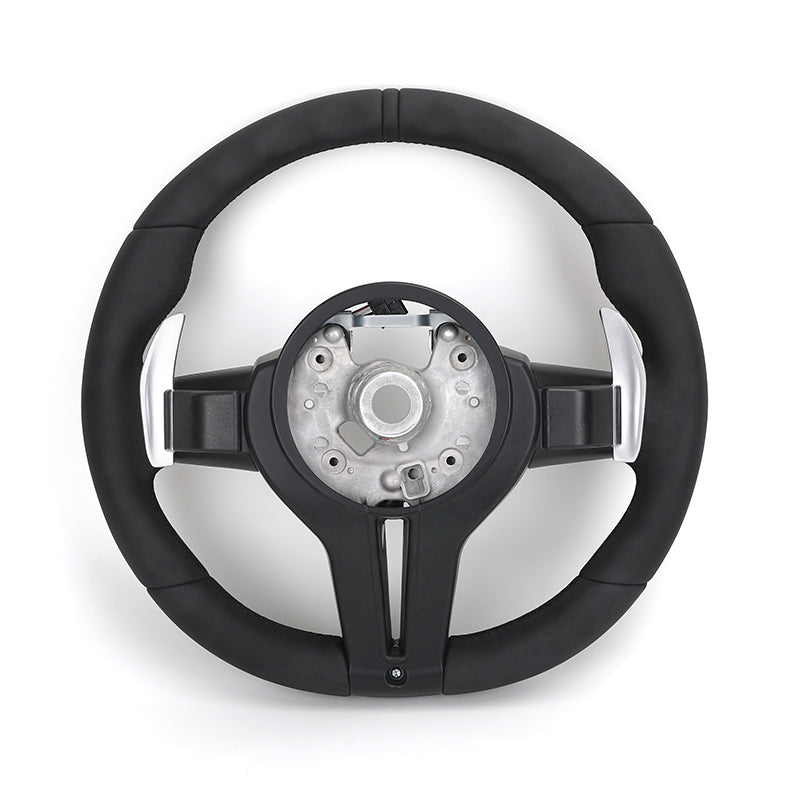 Custom BMW steering wheel upgrade with black grip and silver paddle shifters for enhanced driving control