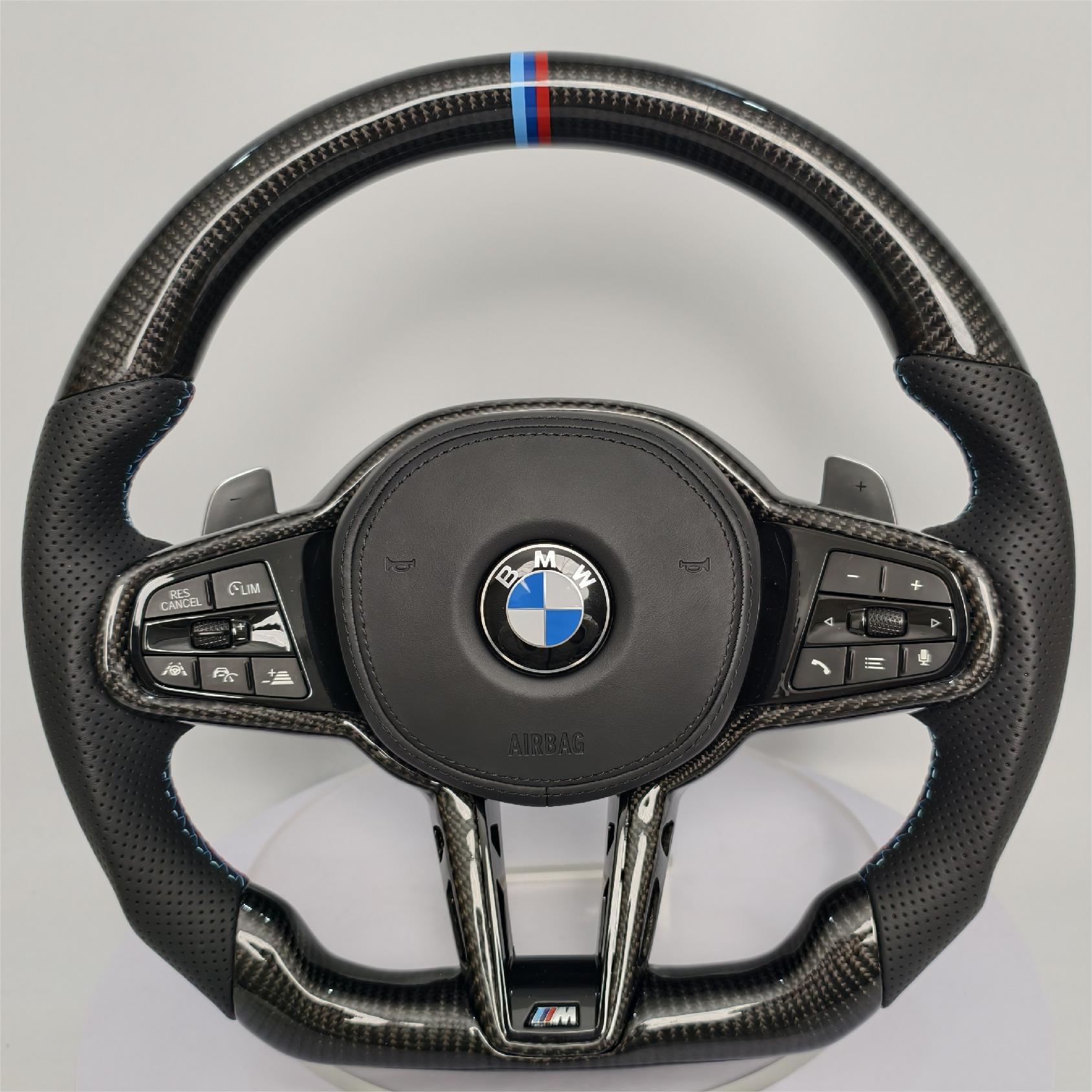 Forged carbon fiber steering wheel BMW with black perforated leather grips and M stripe detail