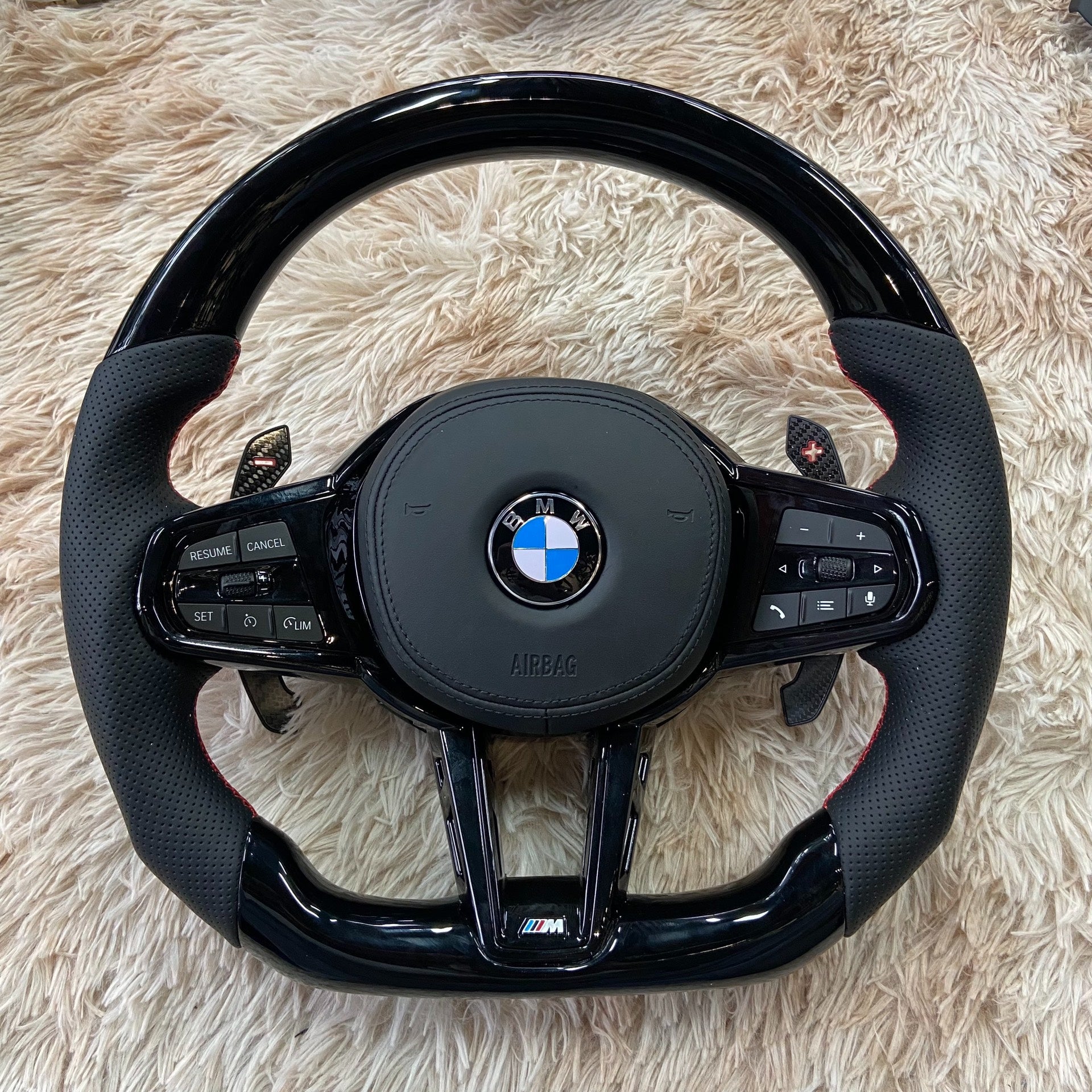 Forged carbon fiber steering wheel BMW with black leather grips and multifunction control buttons