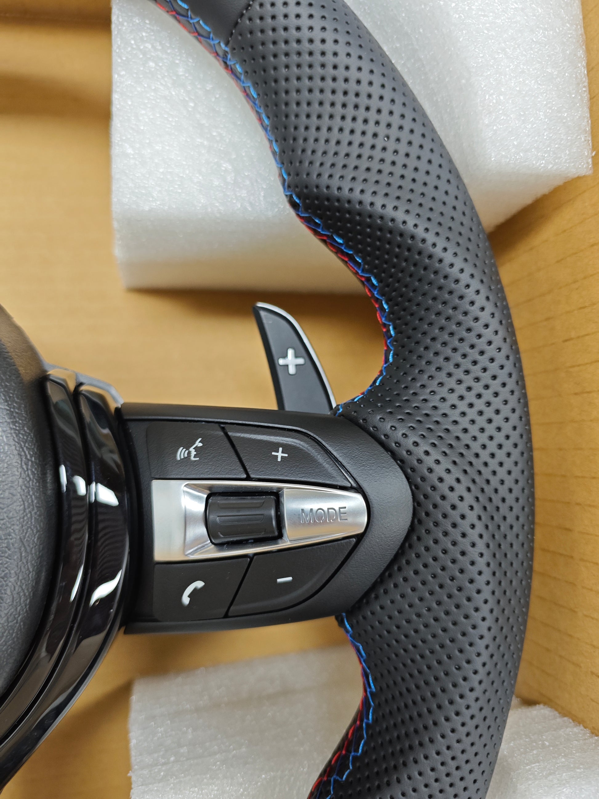 BMW forged carbon steering wheel with perforated leather and multifunction control buttons