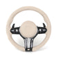 Beige steering wheel with black accents on a white background