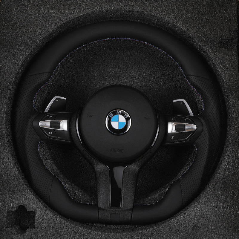 BMW steering wheel with logo on a black background
