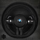 BMW steering wheel with logo on a black background