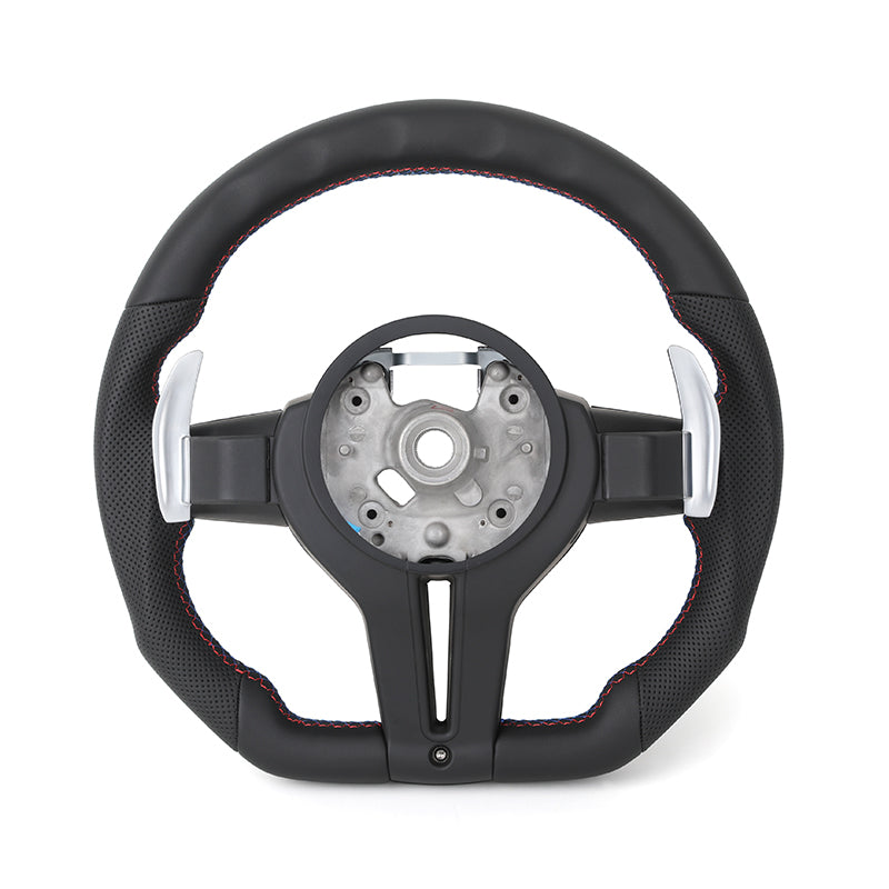 Black steering wheel with red stitching on a white background