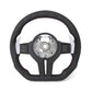 Black steering wheel with red stitching on a white background