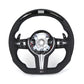 Black steering wheel with silver center on a white background