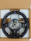 BMW carbon fiber steering wheel with M stripe in protective foam packaging inside a cardboard box