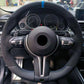 Custom BMW steering wheel upgrade in black suede with blue center marker and multifunction controls