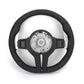 Custom BMW steering wheel upgrade with black grip and silver paddle shifters for enhanced driving control