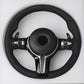 Custom BMW steering wheel upgrade in black leather with multifunction controls and paddle shifters