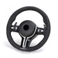 Custom BMW steering wheel upgrade with ergonomic black leather and integrated control buttons