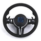 BMW forged carbon steering wheel with black suede grip and integrated control buttons