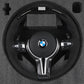 BMW forged carbon steering wheel with control buttons and BMW logo in protective foam packaging