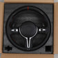 LED BMW steering wheel upgrade in black with red stitching and carbon fiber top in protective packaging