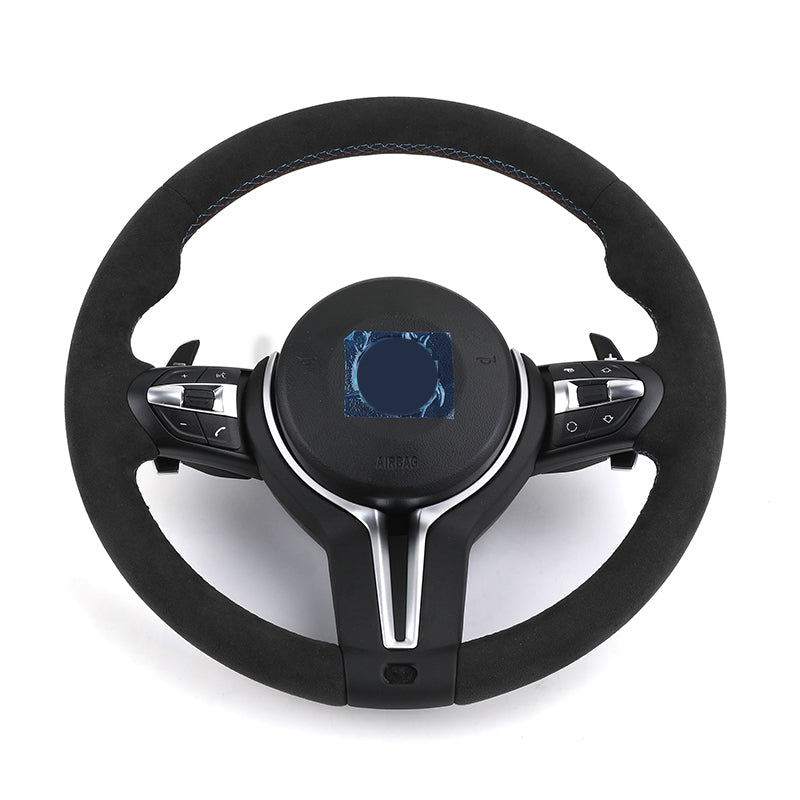 Black custom BMW steering wheel upgrade with control buttons and silver trim for sporty driving